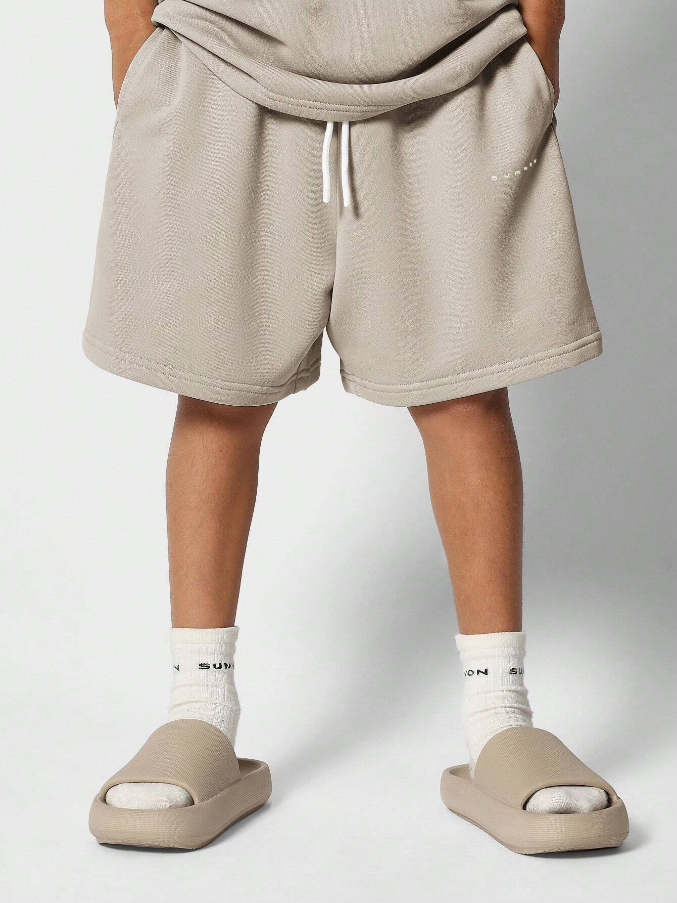 Tween Boys Oversized Fit Short Sleeve Tee And Short With Small Graphic