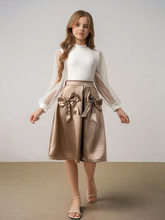 2pcs Girls Elegant Refined High Collar Dropped Shoulder Long Sleeve Mesh Solid Tee And High Waisted Flared Satin Fabric Bow Decor Skirt Set Champagne