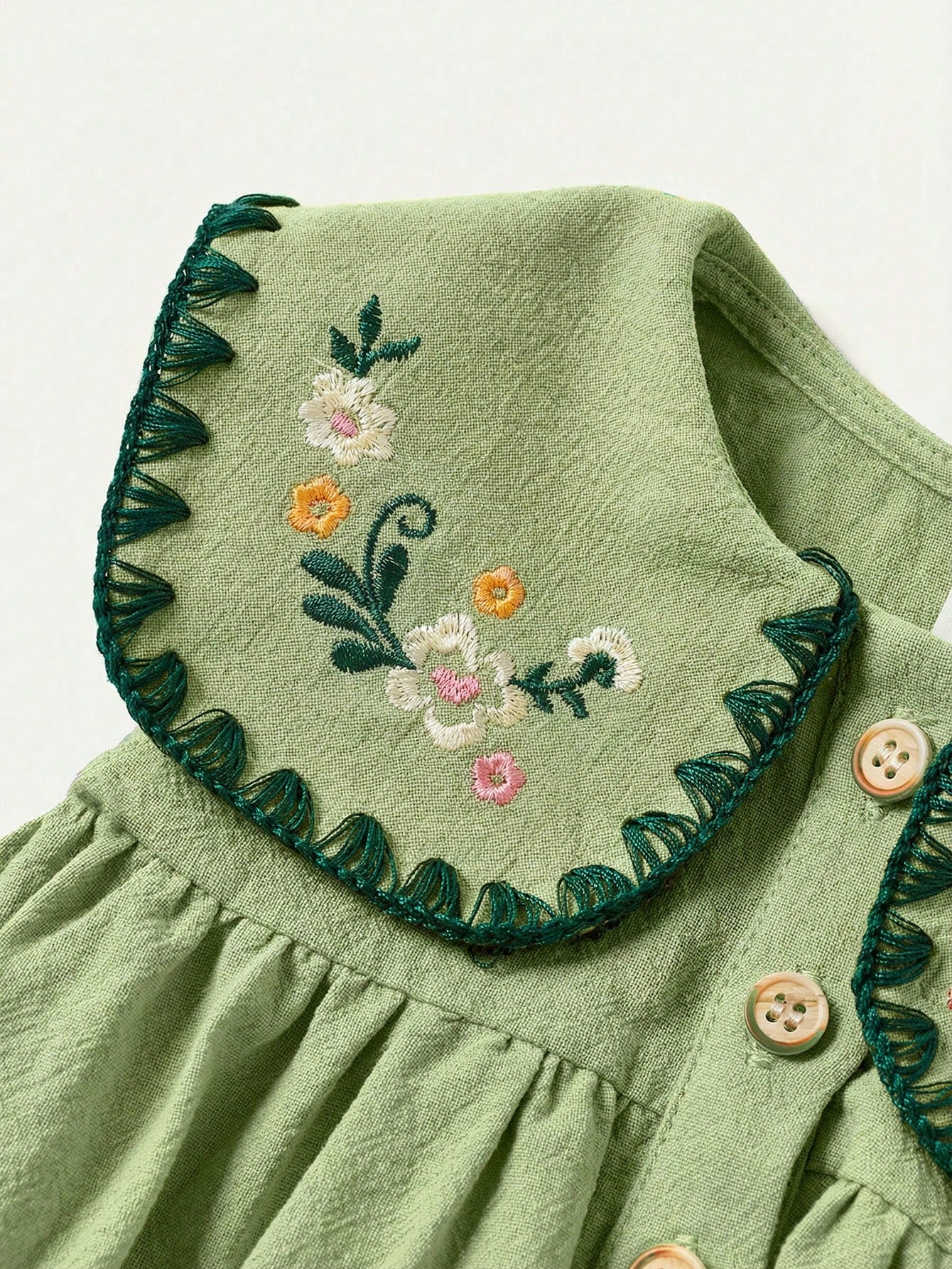 Girls Sleeveless Short Flared Dress With Embroidered Plants Pattern