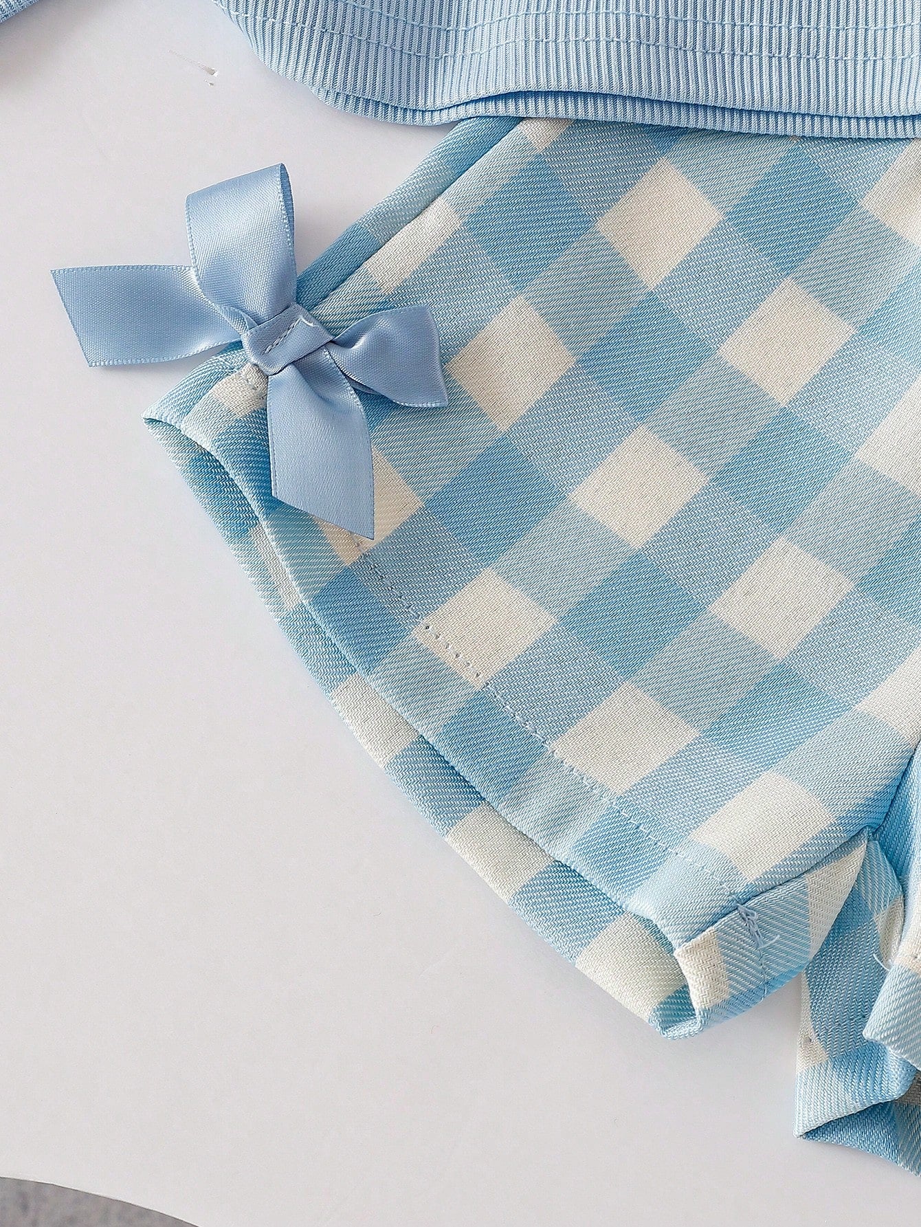 Blue Textured Sleeveless Top And Blue Plaid Shorts Set