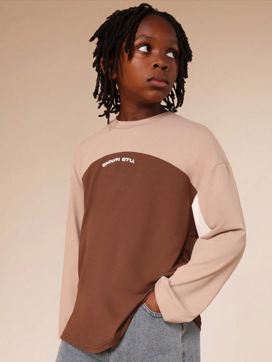 SUMWON Cut And Sew Graphic Long Sleeve Crew Neck Tee With Brand Text Print